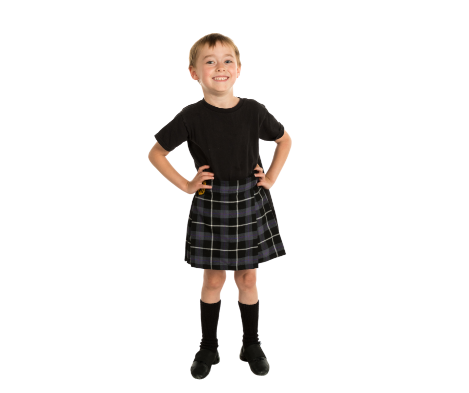 Young kid smiling, excited for his irish dance class.