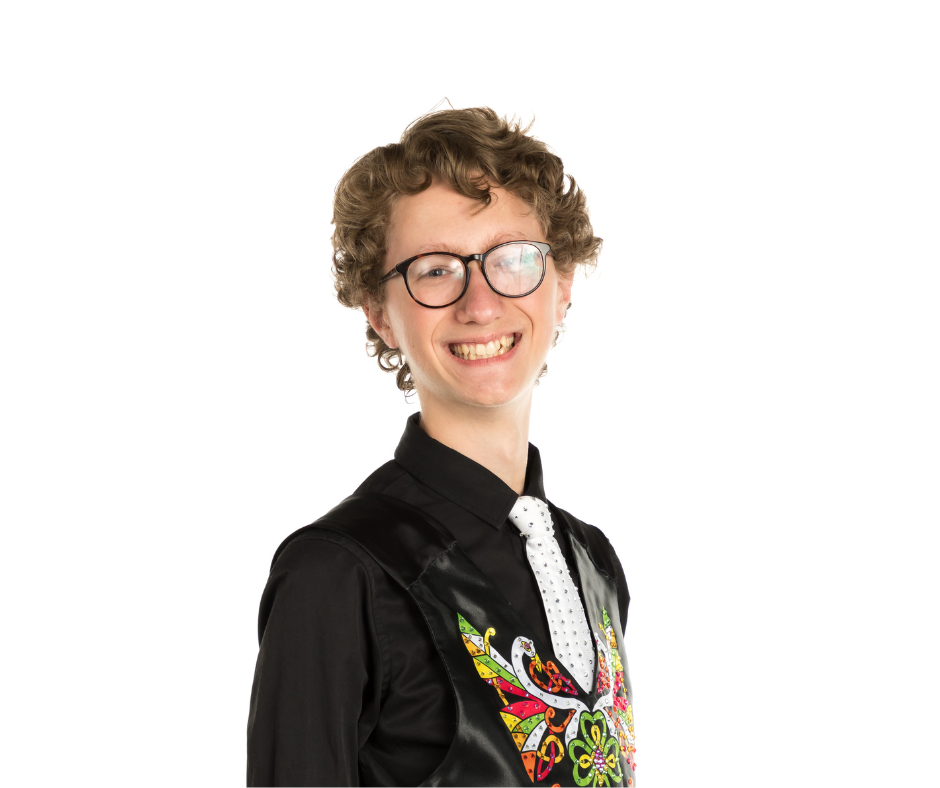Dancer smiling wearing their dance costume at ADC Irish Dance Studio.