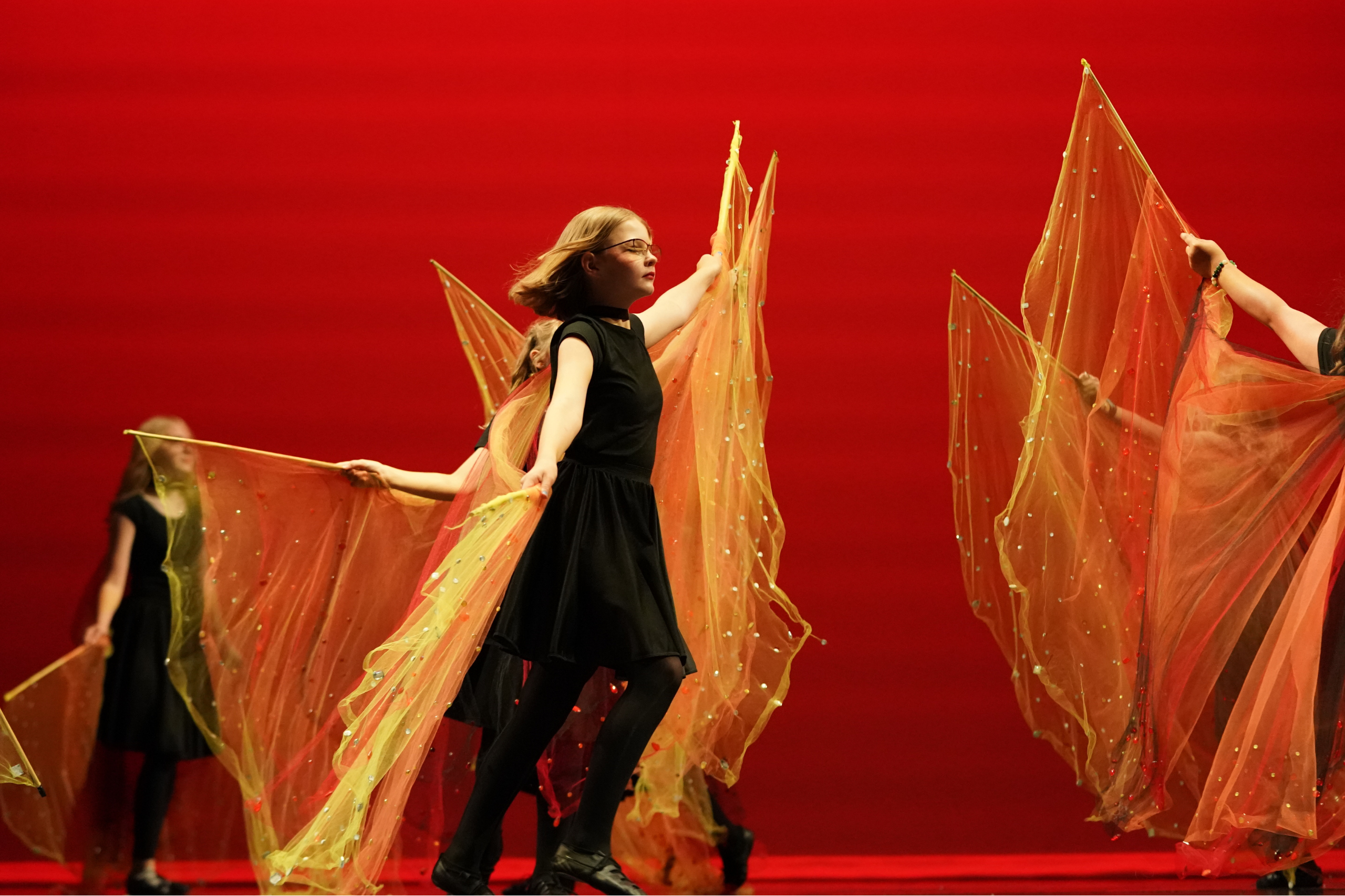 One of our teenage dance classes performing with flags.